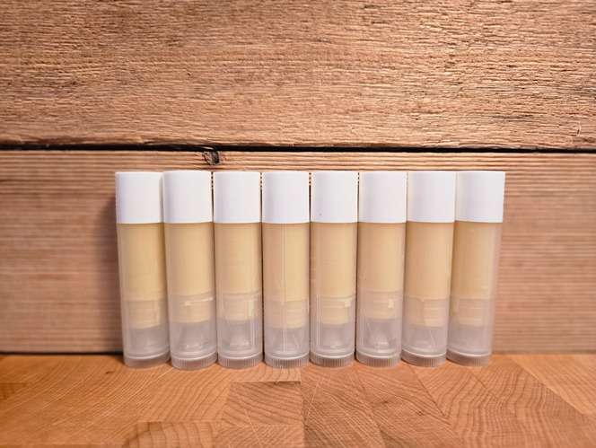 row of tallow chapsticks
